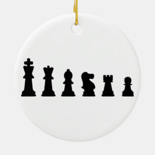 Black chess pieces on white ceramic tree decoration