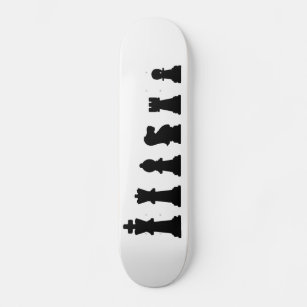Black chess pieces on white skateboard