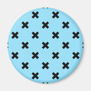 Black cross stitches on baby blue magnet