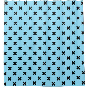Black cross stitches on baby blue shower curtain