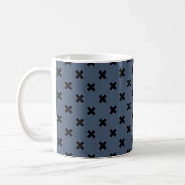 Black cross stitches on blue-grey coffee mug (Left)