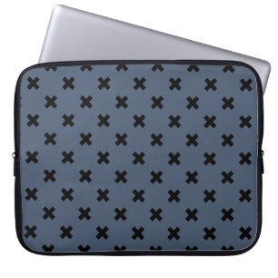 Black cross stitches on blue-grey laptop sleeve