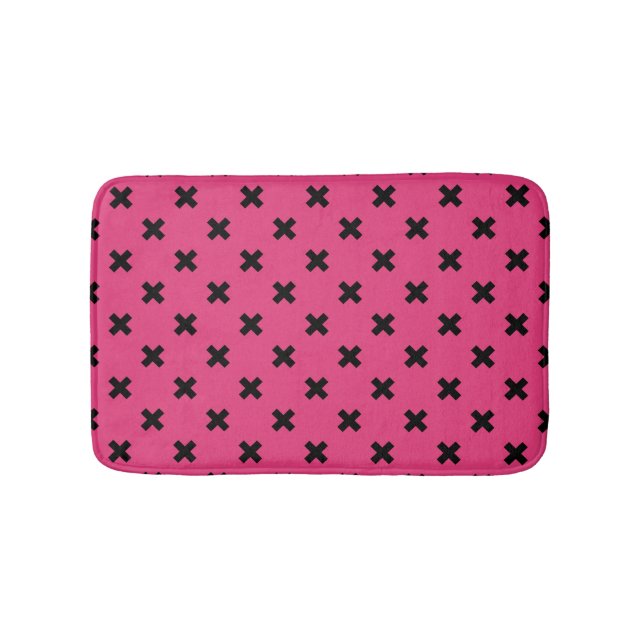 Black cross stitches on fuchsia bath mat (Front)