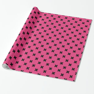 Black cross stitches on fuchsia wrapping paper