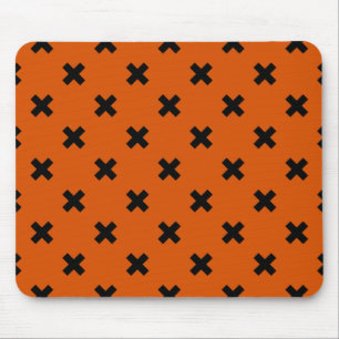 Black cross stitches on orange mouse mat