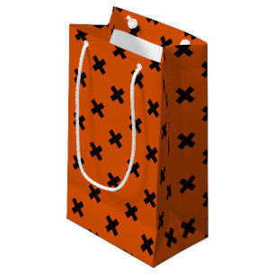 Black cross stitches on orange small gift bag