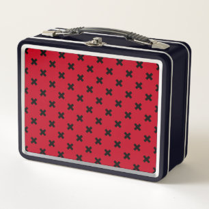 Black cross stitches on red metal lunch box