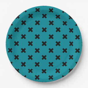 Black cross stitches on teal paper plate