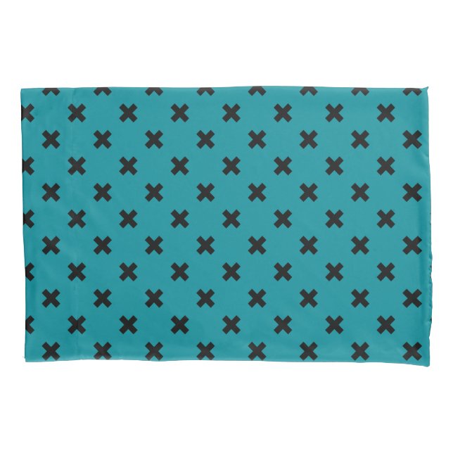 Black cross stitches on teal pillowcase (Front)