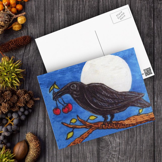 Black Crow Cherries Moonlight Postcard (Black crow on branch holding cherries full moon blue night sky on postcard.)
