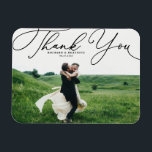 Black Elegant Handwritten Script Photo Wedding Magnet<br><div class="desc">Celebrate your love and show gratitude with our customisable photo wedding thank you magnet! This unique keepsake is perfect for reminding your loved ones of your special day while expressing your heartfelt thanks in a memorable way. It features an elegant white script. Personalise by adding your photo and details. This...</div>