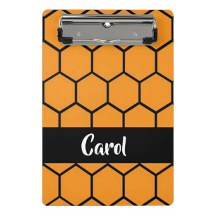 Black fence on orange mini clipboard