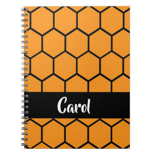Black fence on orange notebook