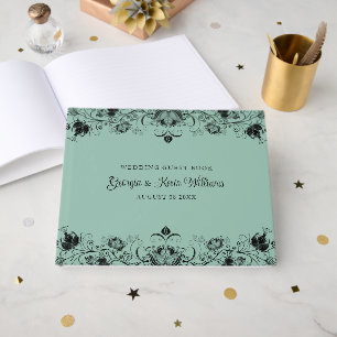 Black floral border on sage green guest book