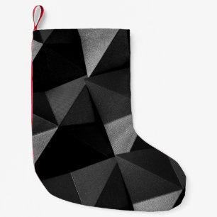 Black folded textured paper abstract shiny origami small christmas stocking