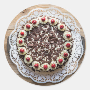 Black Forest cake on rustic wood Classic Round Sticker