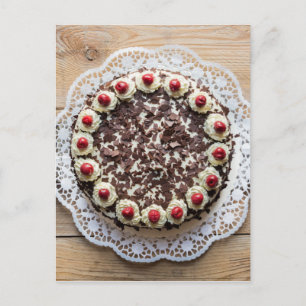 Black Forest cake on rustic wood Postcard
