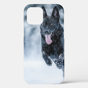 Black German Shepherd in snow Duvet Cover