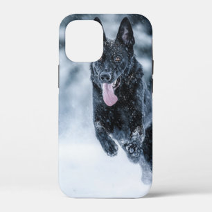 Black German Shepherd in snow Duvet Cover