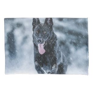 Black German Shepherd in snow Duvet Cover