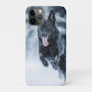 Black German Shepherd in snow Duvet Cover