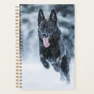 Black German Shepherd in snow Duvet Cover Planner