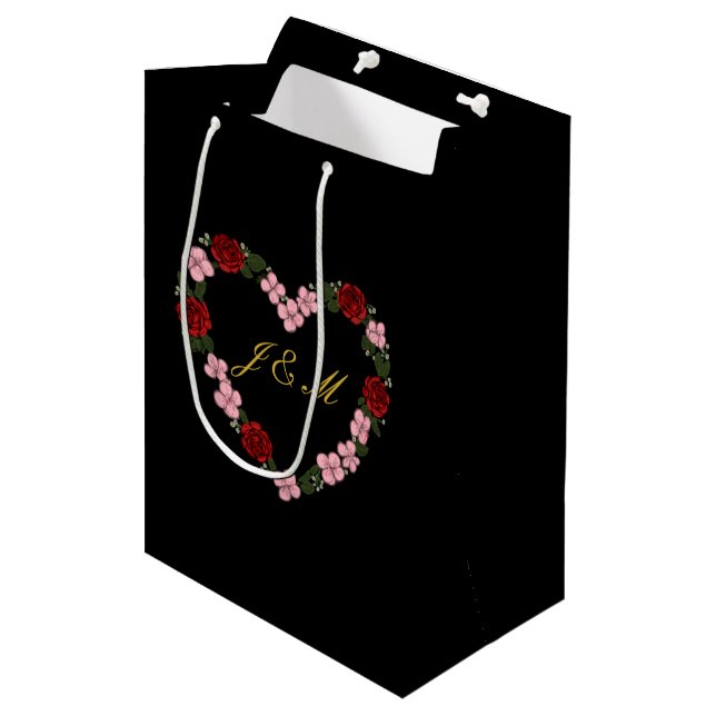 Black gift bag with a pink and red heart (Front Angled)