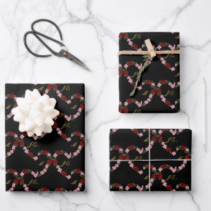 Black gift wrap with a pink and red heart