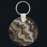 Black Gold Agate Geode Luxury Marble Key Ring<br><div class="desc">Mesmerizing black and charcoal agate with flowing bands of soft gray and creamy white,  dramatically framed and veined in molten liquid gold. This opulent,  high-contrast geode design exudes modern luxury,  sophistication and powerful elegance perfect for those who love dark,  glamorous mineral aesthetics.</div>