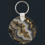 Black Gold Agate Geode Luxury Marble Key Ring<br><div class="desc">Mesmerizing black and charcoal agate with flowing bands of soft gray and creamy white,  dramatically framed and veined in molten liquid gold. This opulent,  high-contrast geode design exudes modern luxury,  sophistication and powerful elegance perfect for those who love dark,  glamorous mineral aesthetics.</div>