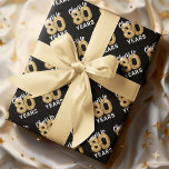 Black Gold Cheers to 80 Years Birthday Wrapping Paper Sheet<br><div class="desc">Elegant eightieth adult birthday wrapping paper featuring a stylish black background that can be changed to any colour,  gold sparkly glitter,  and the saying "cheers to 80 years" using eighty gold hellium balloons.</div>
