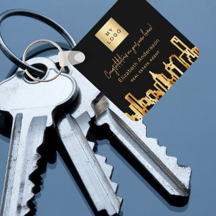 Black gold city skyline real estate agent logo key ring