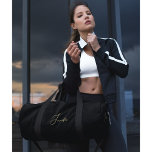 Black Gold Elegant Monogrammed Gym Sports Travel Duffle Bag<br><div class="desc">Create your own custom, personalised, elegant faux gold script / typography monogram monogrammed, lightweight, durable Polyester Poplin, men women solid jet black travel gym sports carry-on duffle bag, with rugged 22" carry handles, removable and adjustable (27" to 48") shoulder strap with shoulder pad and metal swivel hooks, laminate lining with...</div>