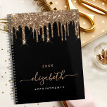 Black gold glitter drips monogram name 2025 planner<br><div class="desc">An elegant black background with faux gold glitter drips, paint dripping look. Personalise and add a year, name and a title. The name is written with a golden large modern hand lettered style script. Perfect for school, work or organising your personal/family life. To keep the swashes only delete the sample...</div>