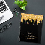 Black gold glitter drips monogram planner<br><div class="desc">A chic black background with trendy faux gold glitter drips, paint dripping look. Personalise and add a year, name and a title. The name is written with a modern hand lettered style script with swashes. Perfect for school, work or organising your personal/family life. To keep the swashes only delete the...</div>