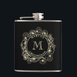 Black Gold Groomsman Monogram Flask<br><div class="desc">Celebrate your best men in style with this black and gold groomsman flask,  featuring an elegant floral crest and monogram design. A classic wedding gift with a luxe,  personalised touch.
Need custom names or initials? I’m happy to help – just write me at bpkolman@gmail.com</div>