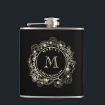 Black Gold Groomsman Monogram Flask<br><div class="desc">Celebrate your best men in style with this black and gold groomsman flask,  featuring an elegant floral crest and monogram design. A classic wedding gift with a luxe,  personalised touch.
Need custom names or initials? I’m happy to help – just write me at bpkolman@gmail.com</div>