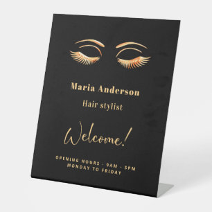 Black gold makeup artist opening hours welcome pedestal sign