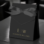 Black Gold Modern Minimalist Monogram Name Favour Box<br><div class="desc">Elevate your event's favours with our Classic Elegant Modern Minimalist Monogram Favour Box. Meticulously designed, these favour boxes seamlessly blend timeless sophistication with contemporary minimalism, making them a stylish and memorable addition to your celebration. Crafted with precision and attention to detail, these favour boxes are more than just containers; they...</div>