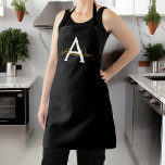 Black Gold Modern Script Girly Monogram Name Apron<br><div class="desc">Black and Gold Monogram Name Apron. This makes the perfect sweet 16 birthday,  wedding,  bridal shower,  anniversary,  baby shower or bachelorette party gift for someone that loves glam luxury and chic styles.</div>