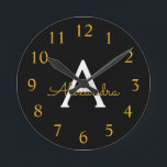 Black Gold Modern Script Girly Monogram Name Round Clock<br><div class="desc">Black and Gold Simple Script Monogram Name Clock. This makes the perfect sweet 16 birthday,  wedding,  bridal shower,  anniversary,  baby shower or bachelorette party gift for someone that loves glam luxury and chic styles.</div>