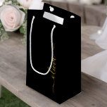 Black Gold Modern Script Girly Monogram Name Small Gift Bag<br><div class="desc">Black and Gold Simple Script Monogram Name Gift Bag. This makes the perfect sweet 16 birthday,  wedding,  bridal shower,  anniversary,  baby shower or bachelorette party gift bag for someone that loves glam luxury and chic styles.</div>