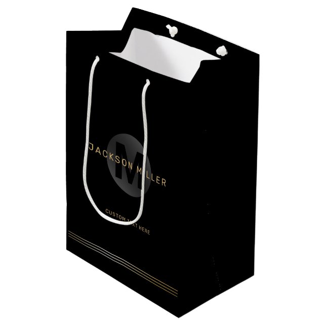 Black & gold modern simple personalised monogram medium gift bag (Front Angled)