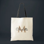 Black Gold Monogram Elegant Girly Script Tote Bag<br><div class="desc">Chic black and gold monogram tote bag. Designed by Thisisnotme©</div>