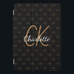 Black gold monogram initials name script elegant iPad pro cover<br><div class="desc">Personalise and add your monogram letters,  initials and name.  The monogram initials as a pattern on the background.   A classic chic black background colour.  White and golden coloured letters.</div>