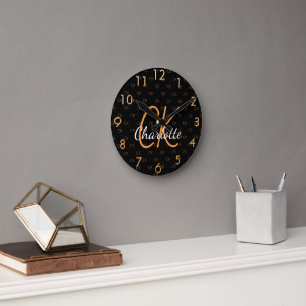 Black gold monogram initials name script elegant round clock