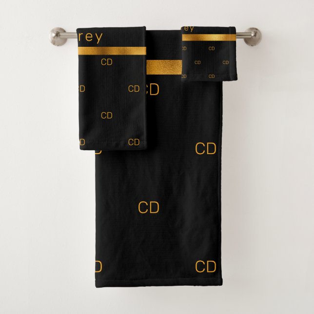 Black gold monogram initials pattern name bath towel set (Insitu)