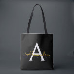 Black Gold Name White Girly Script Monogram Modern Tote Bag<br><div class="desc">Black and Gold Elegant Add Your Own Name Monogram Book Bag. This Book Bag can be customised to include your initial and first name and given as a gift for Christmas,  Sweet 16 Birthday,  Bridal Shower or a Wedding.</div>