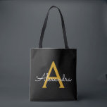 Black Gold Name White Girly Script Monogram Modern Tote Bag<br><div class="desc">Black and Gold Elegant Add Your Own Name Monogram Book Bag. This Book Bag can be customised to include your initial and first name and given as a gift for Christmas,  Sweet 16 Birthday,  Bridal Shower or a Wedding.</div>