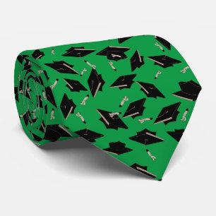 Black Graduation Caps Tossed in the Air on Green Tie